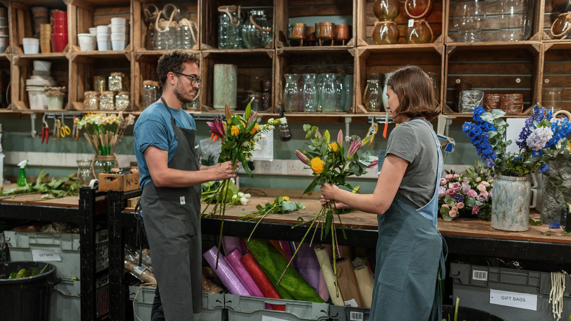 two florists creating bouquets